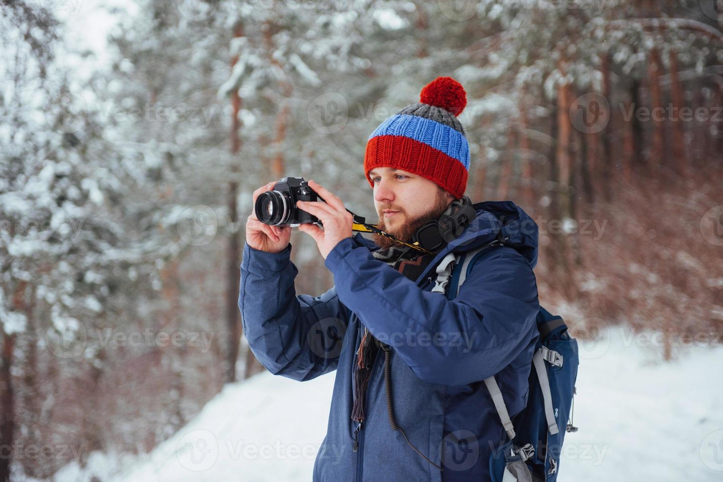 Man Traveler with backpack hiking Travel Lifestyle adventure concept active vacations outdoor. Beautiful landscape  forest photo