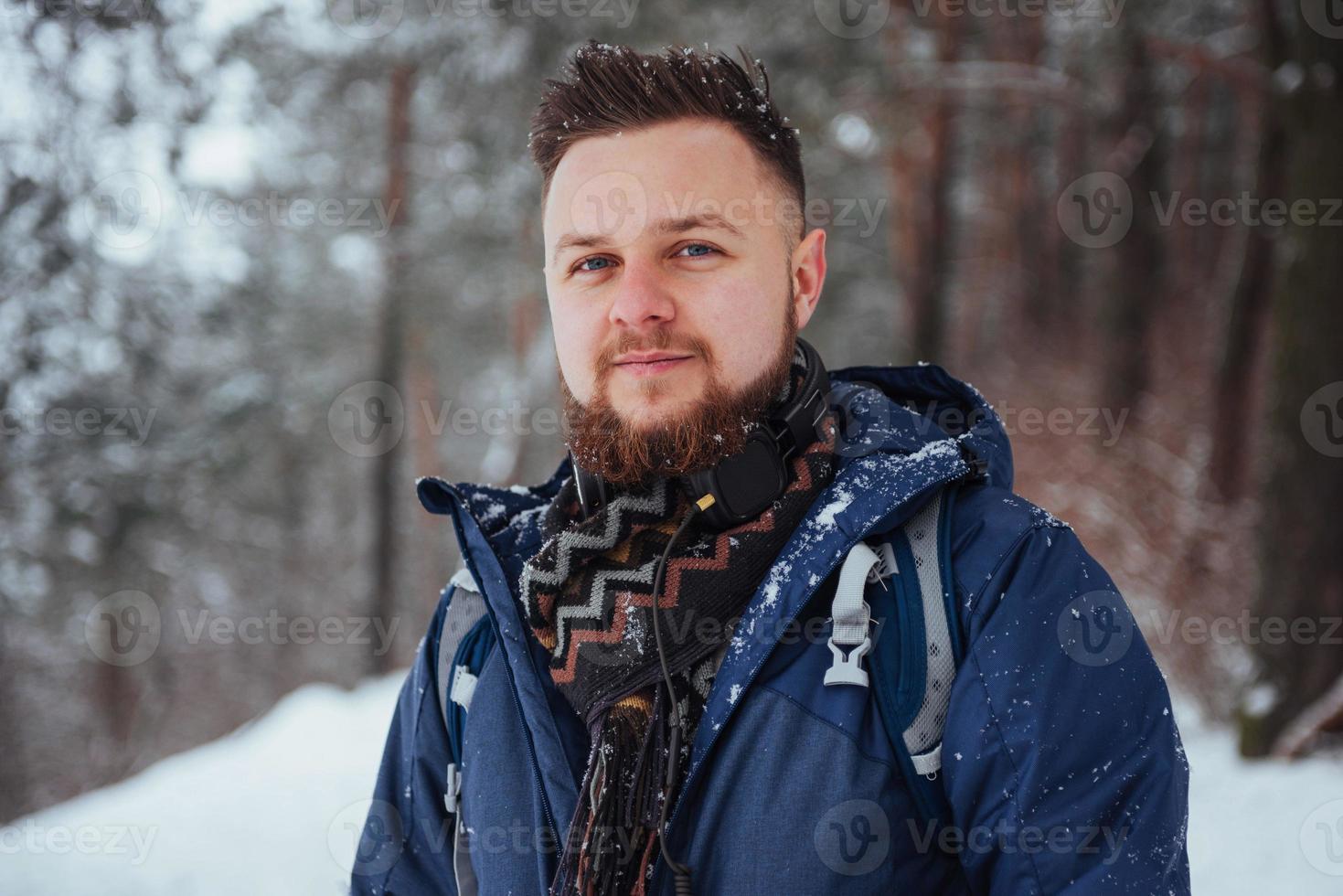 Man Traveler with backpack hiking Travel Lifestyle adventure concept active vacations outdoor. Beautiful landscape  forest photo