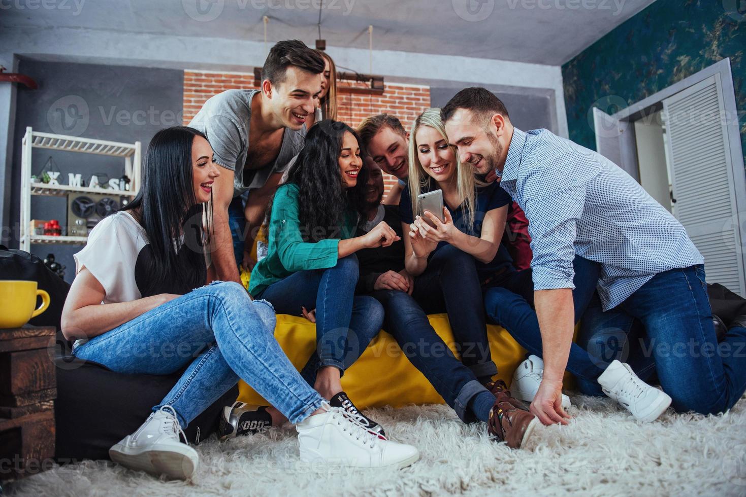 Group portrait of Cheerful old friends communicate with each other, friend posing on cafe, Urban style people having fun, Concepts about youth togetherness lifestyle. Wifi connected photo