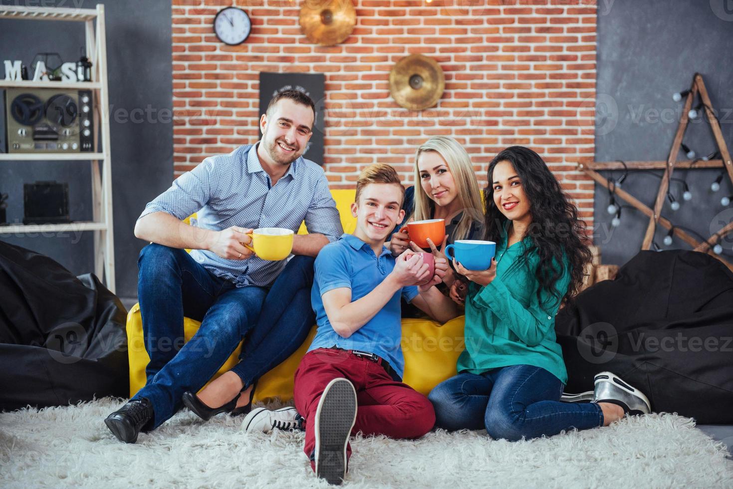 Group portrait of Cheerful old friends communicate with each other, friend posing on cafe, Urban style people having fun, Concepts about youth togetherness lifestyle. Wifi connected photo