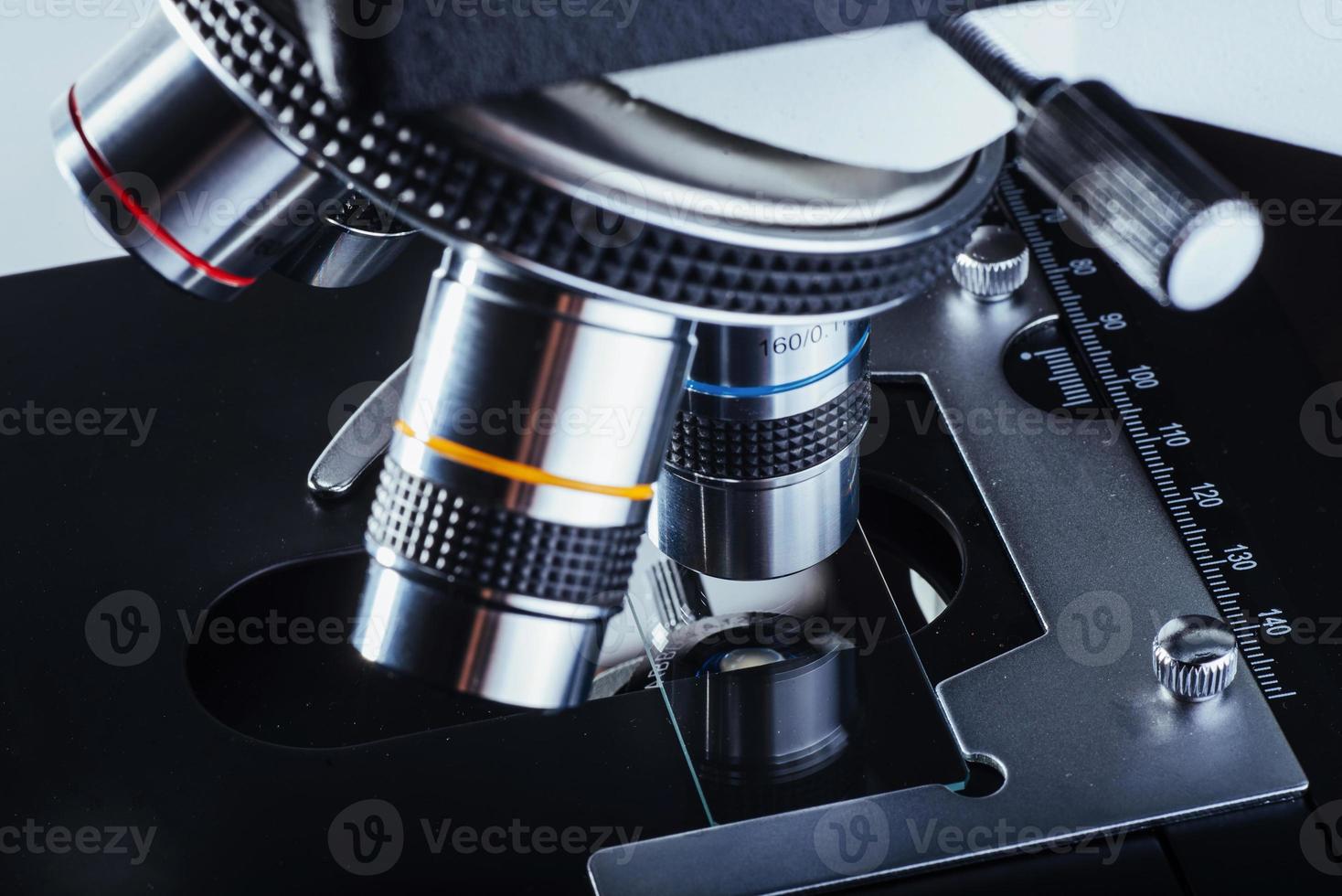 Close up of microscope at the laboratory. photo