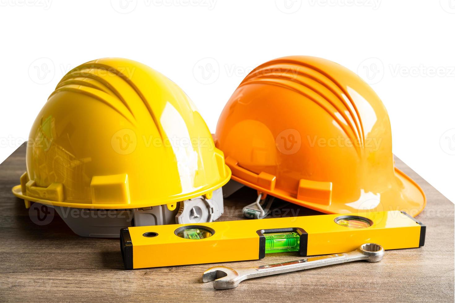 Safety first hard helmet hat and engineer tool with copy space, engineering construction and architecture concept. photo