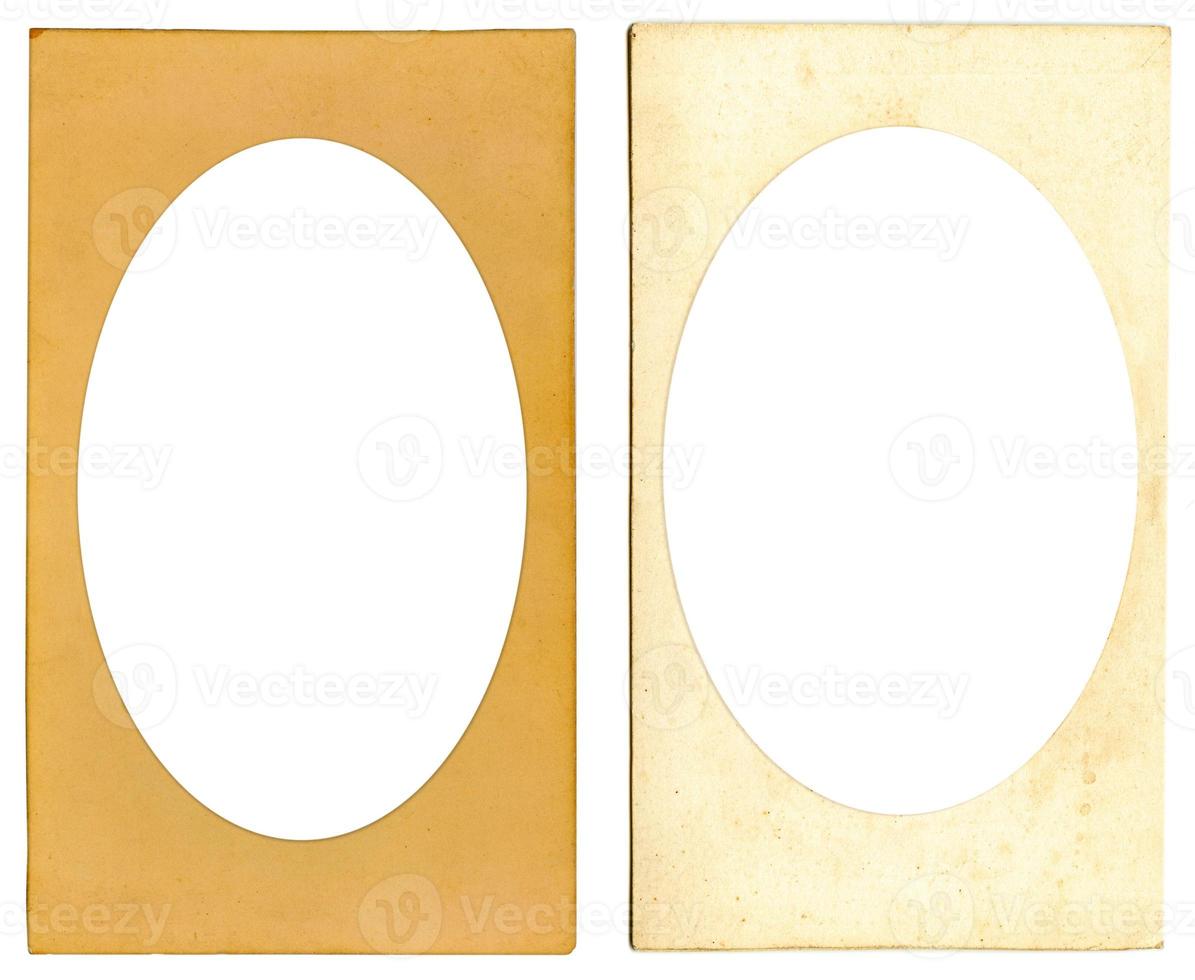 Old cardboard photo frame with ellipse vignette and empty space inside isolated on white background. Mock up