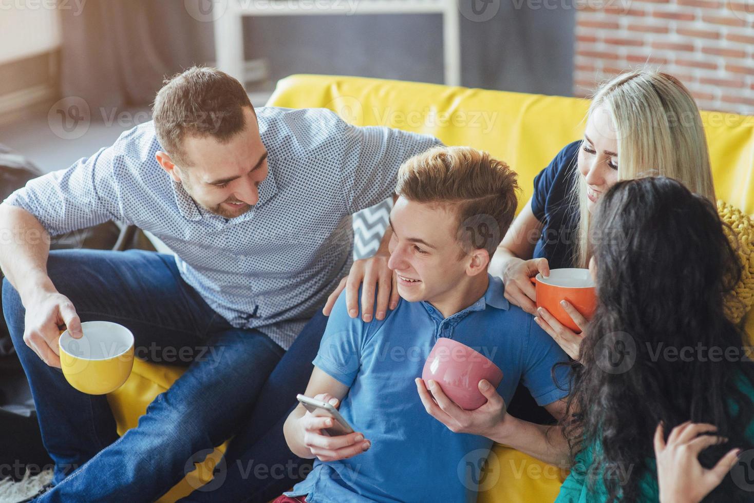 Group portrait of Cheerful old friends communicate with each other, friend posing on cafe, Urban style people having fun, Concepts about youth togetherness lifestyle. Wifi connected photo