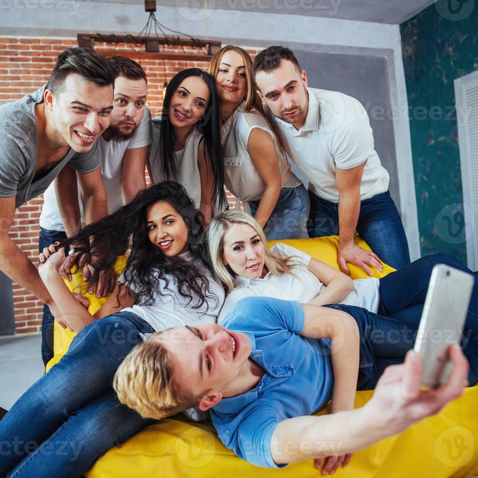 Group beautiful young people doing selfie in a cafe, best friends girls and boys together having fun, posing emotional lifestyle concept photo