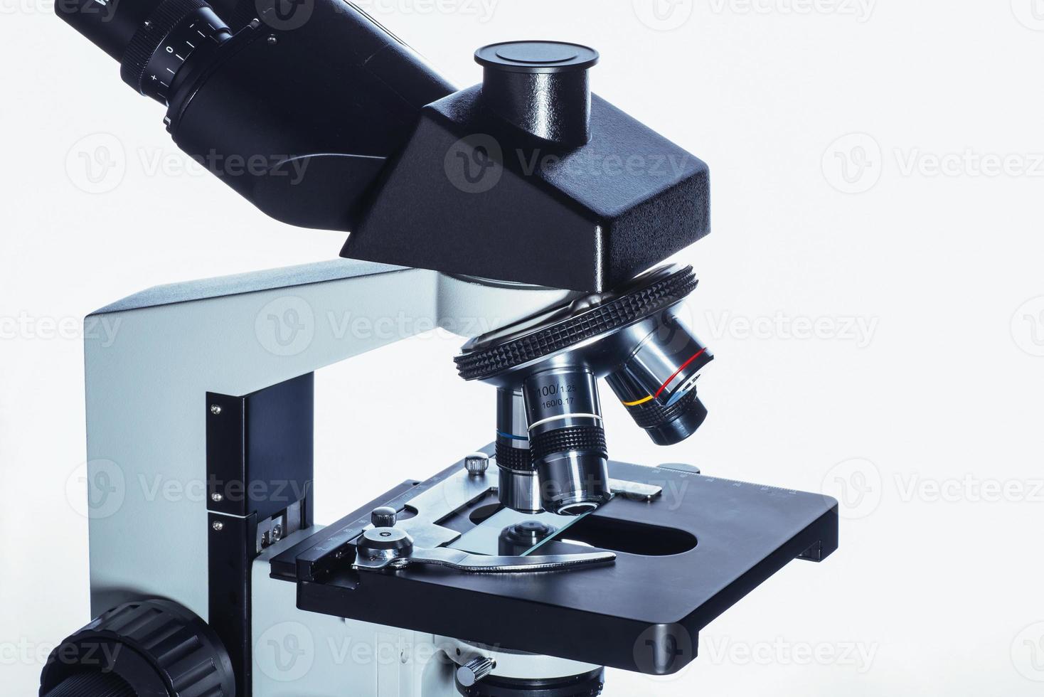 Close up of microscope at the laboratory. photo