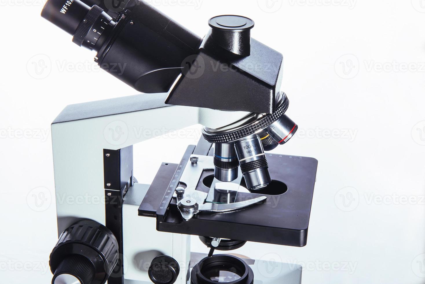Close up of microscope at the laboratory. photo