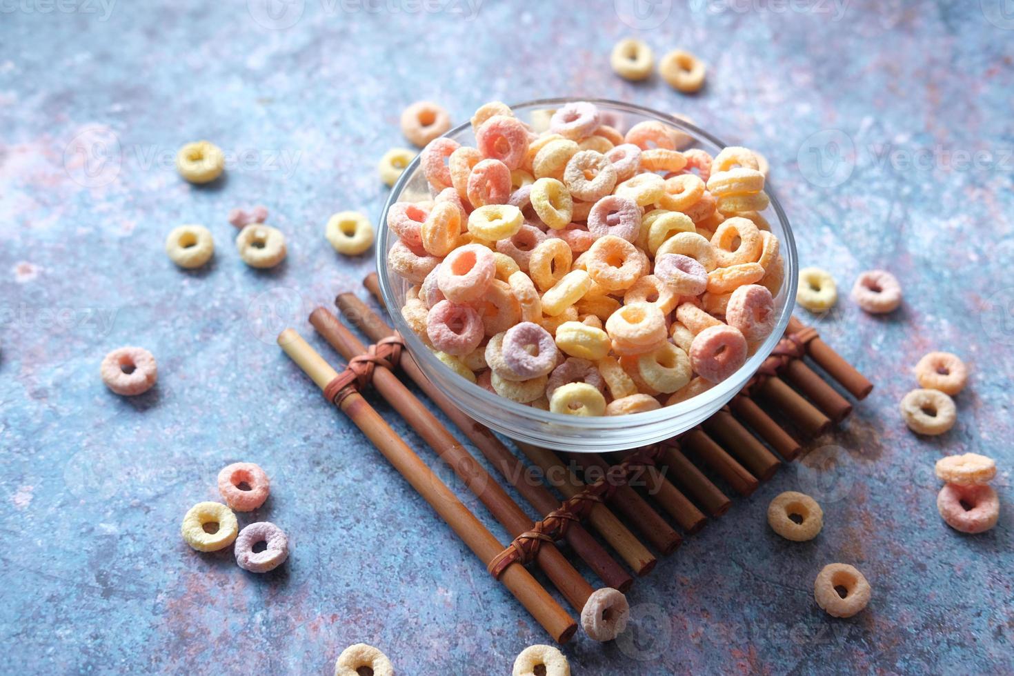close up of colorful cereal corn flakes in a bowl photo