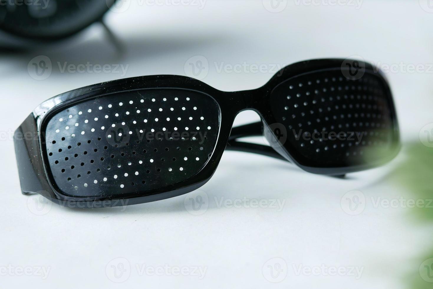 Perforation glasses with holes for training vision photo