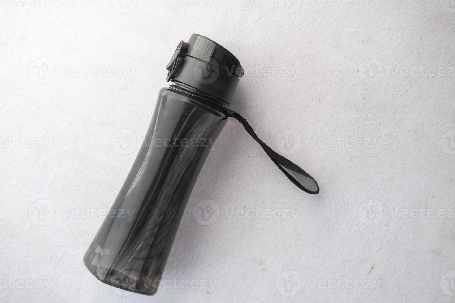 black color plastic water bottle on white photo