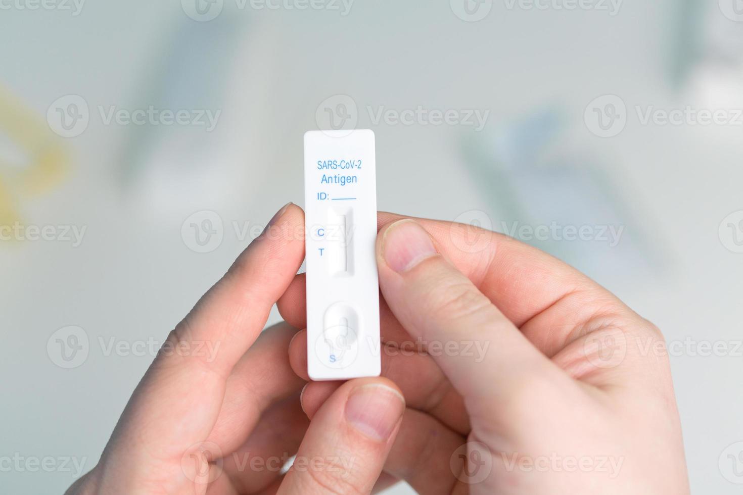 Corona virus antigen fast test. Lab card kit test for COVID-19. photo