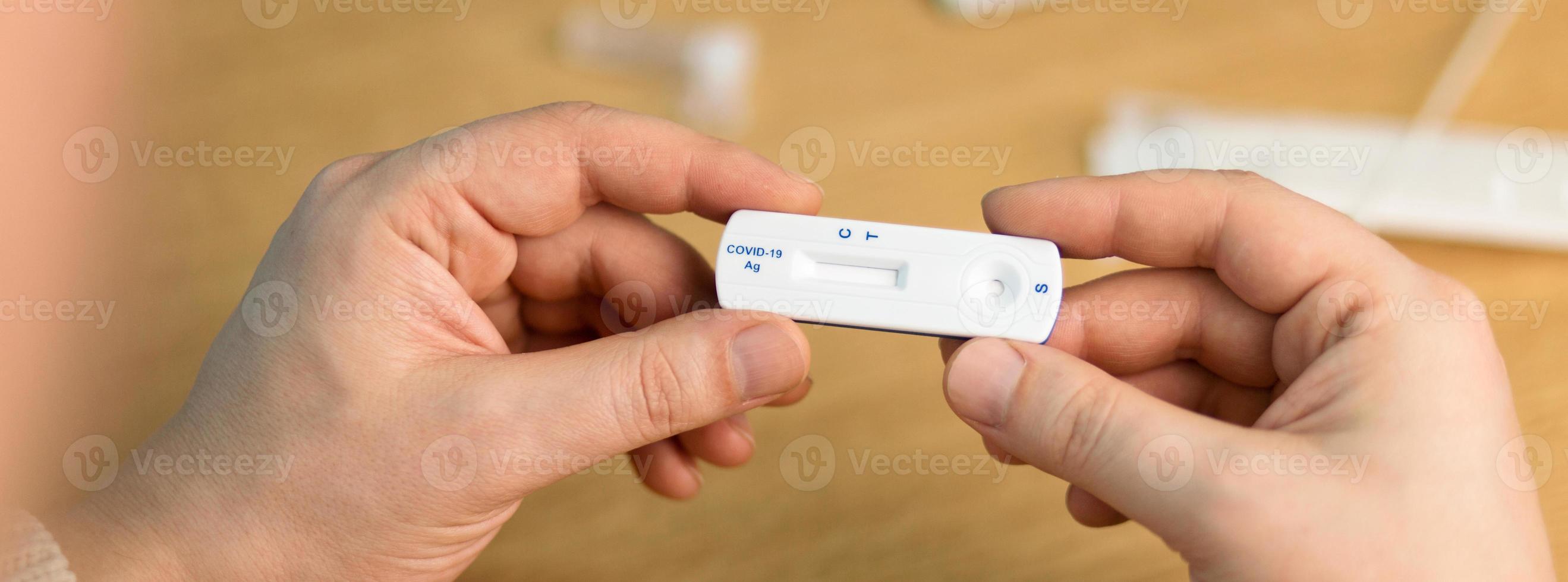 Corona virus antigen fast test. Lab card kit test for COVID-19. photo
