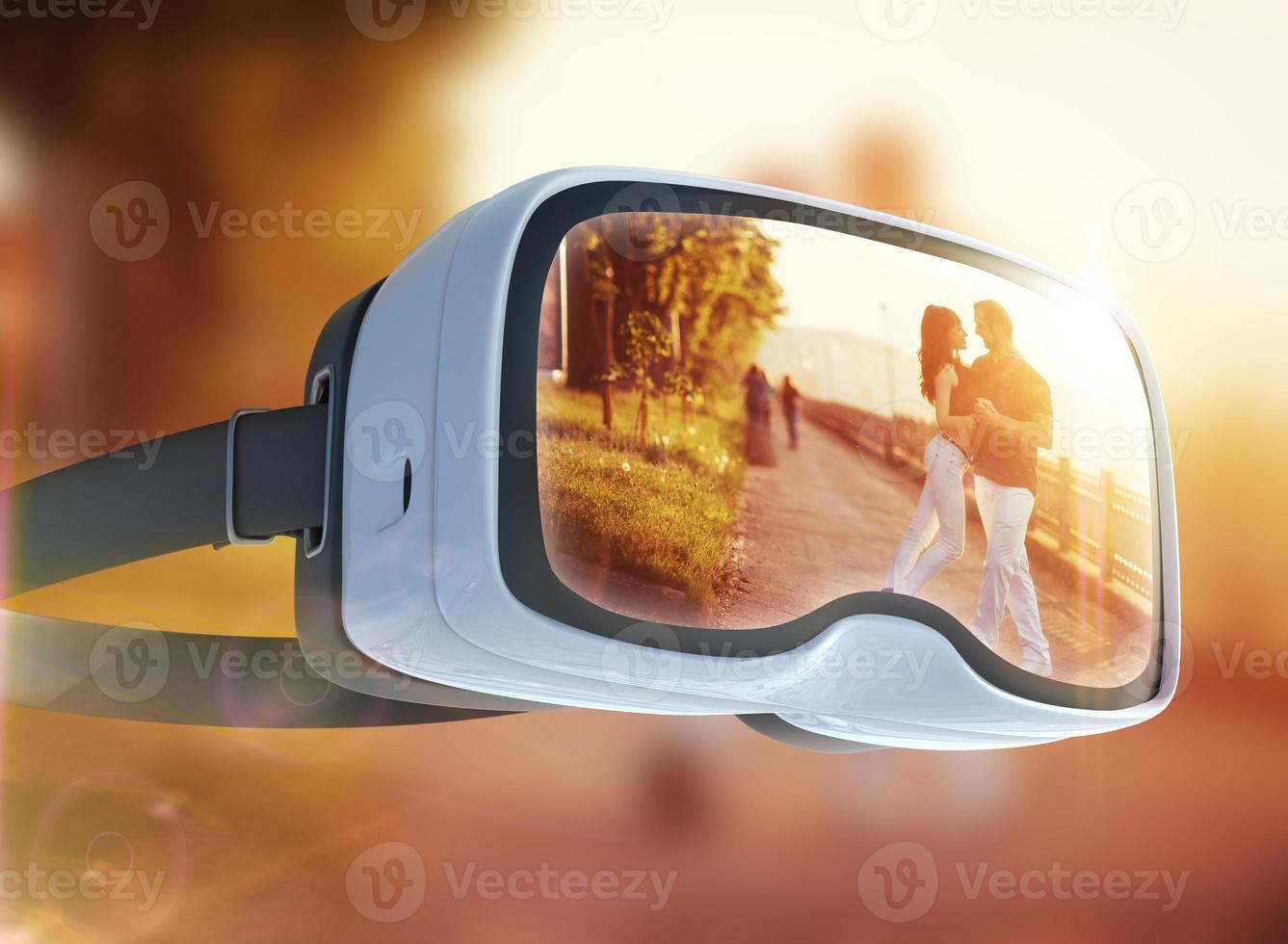 Virtual reality headset, double exposure. Young couple dancing tango on the quay photo