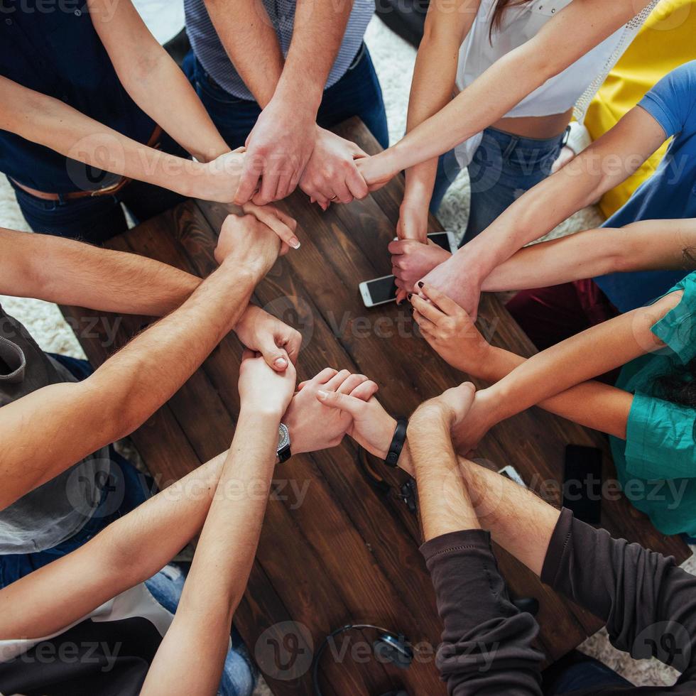 Group of Diverse Hands Together Joining. Concept  teamwork and friendship photo