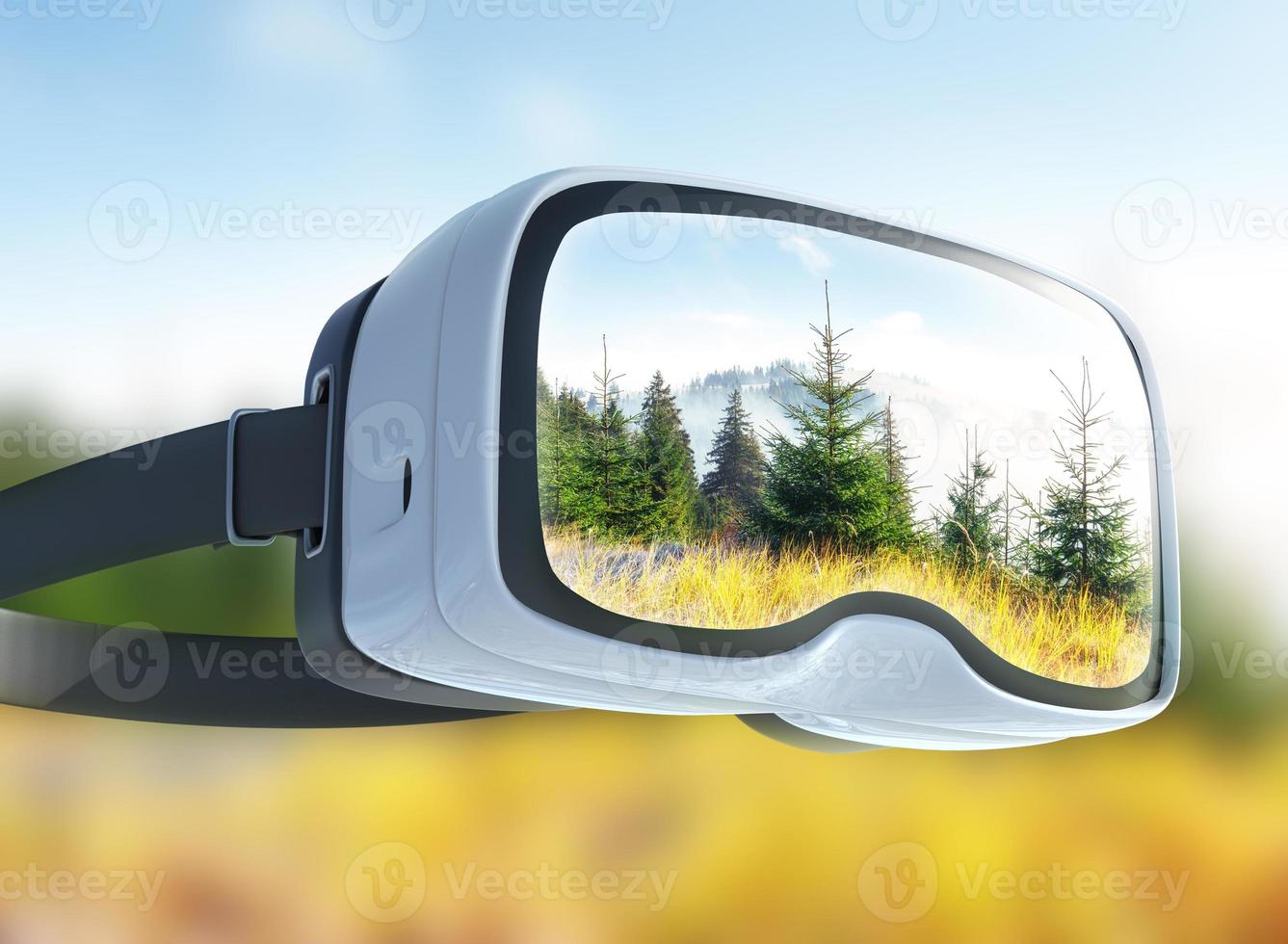 Virtual reality headset, double exposure, View of mountain peaks in spring photo