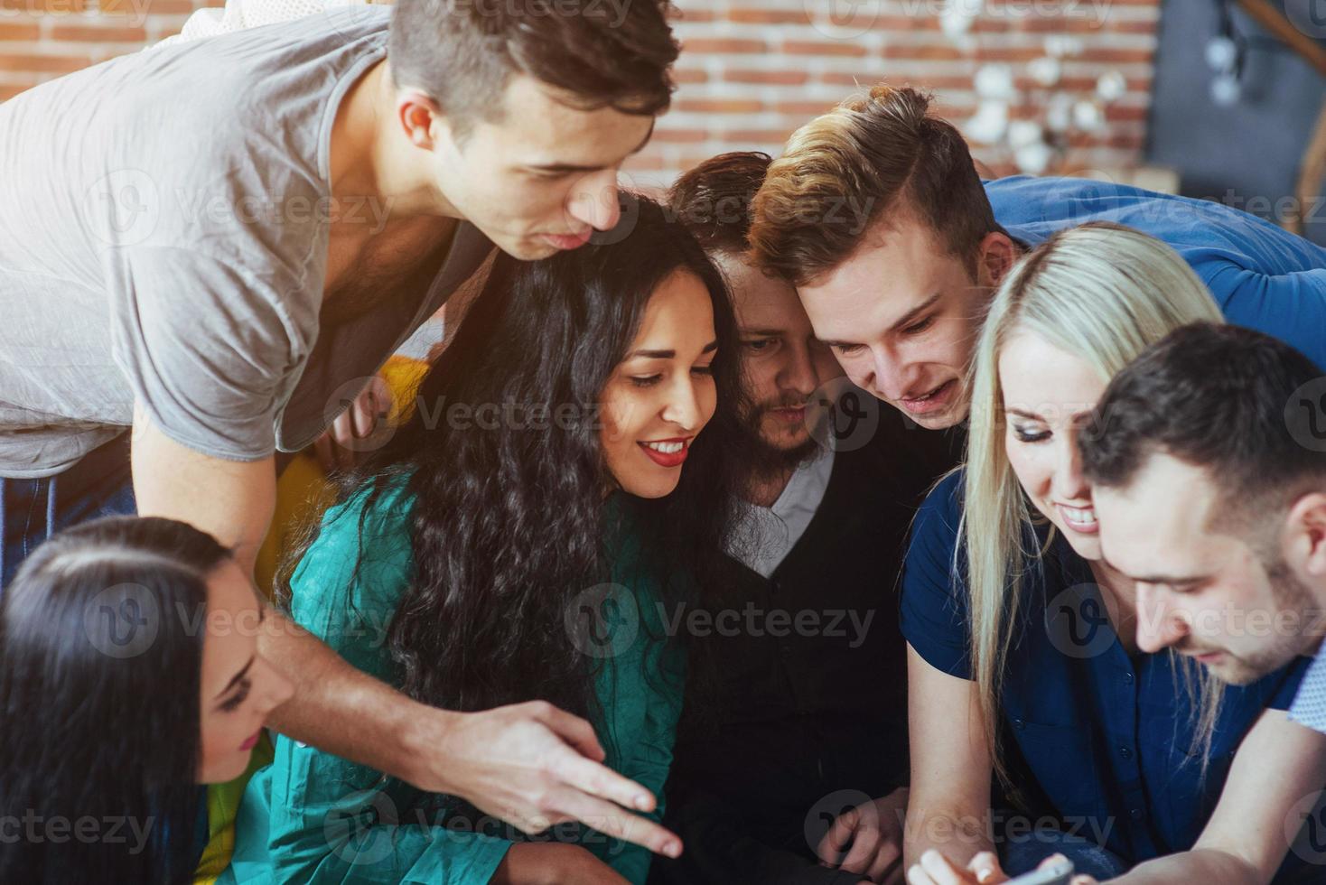 Group portrait of Cheerful old friends communicate with each other, friend posing on cafe, Urban style people having fun, Concepts about youth togetherness lifestyle. Wifi connected photo