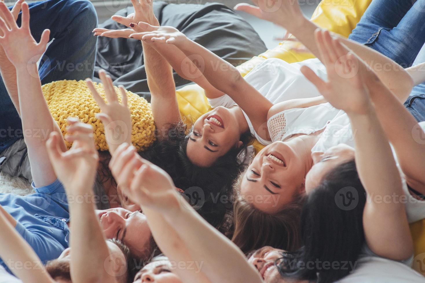 Group beautiful young people doing selfie lying on the floor, best friends girls and boys together having fun, posing emotional lifestyle  concept photo
