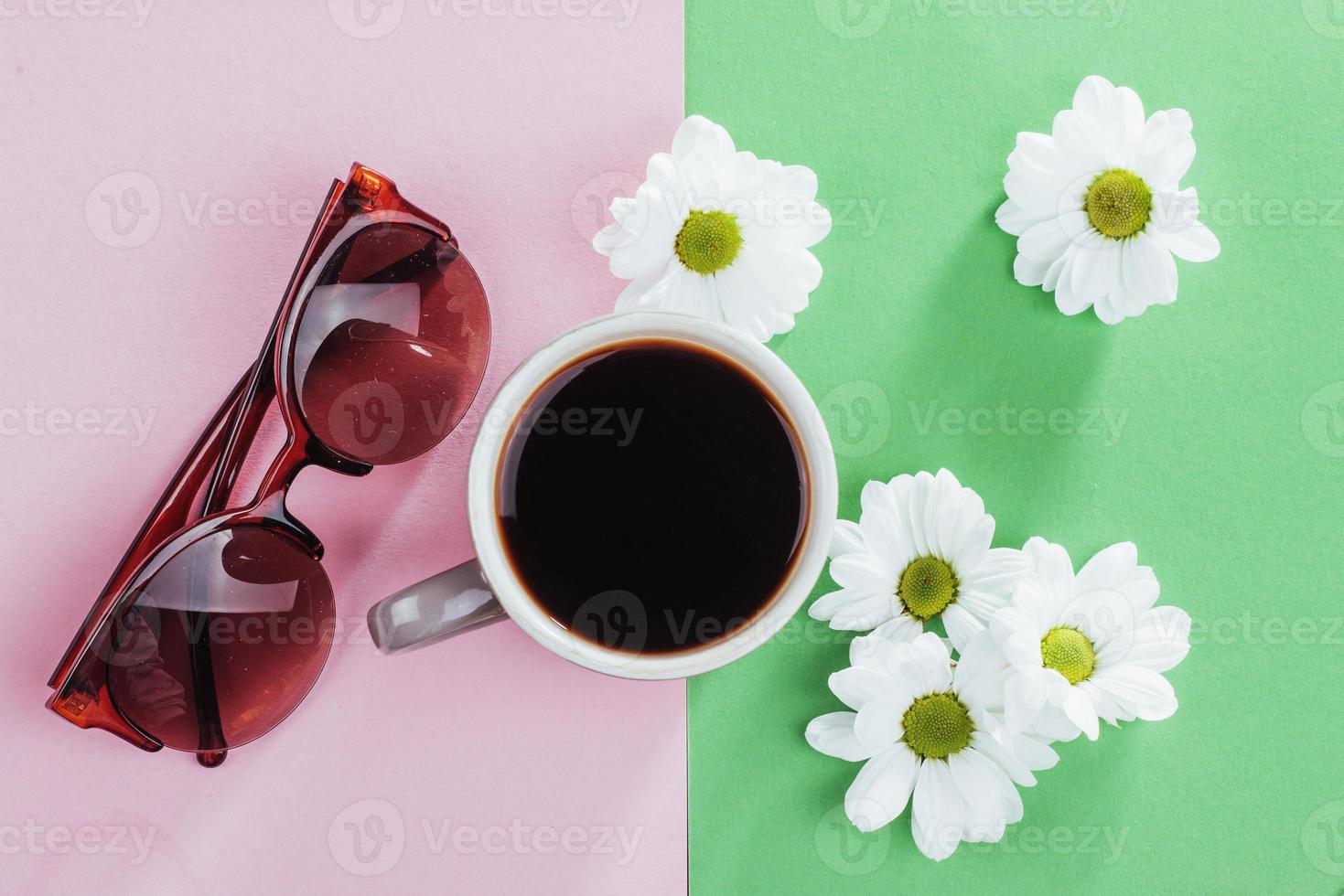 coffee and white flowers  glasses photo