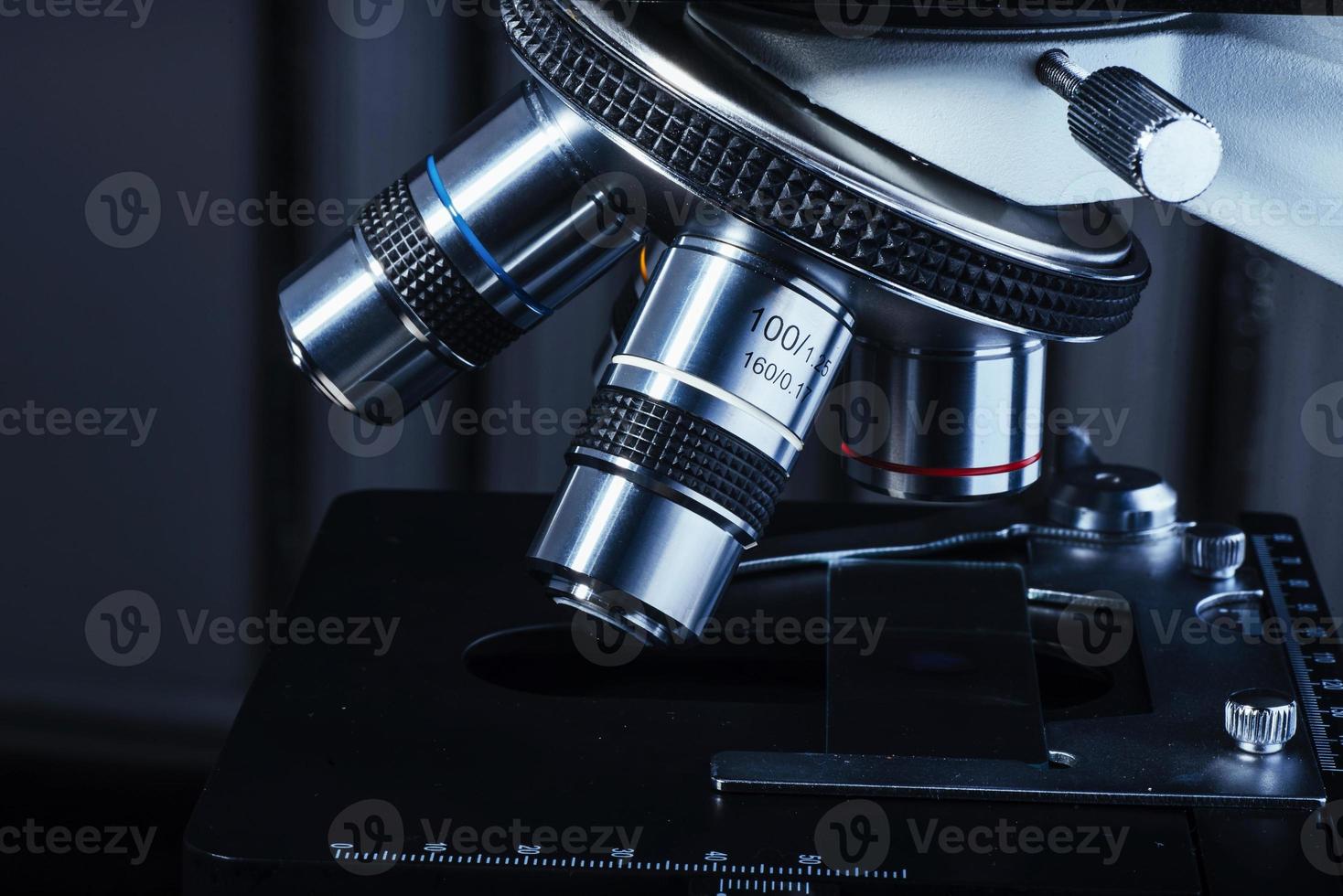 Close up of microscope at the laboratory. photo