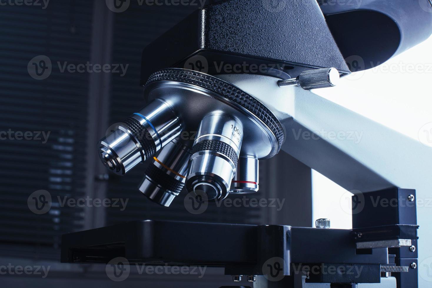 Close up of microscope at the laboratory. photo