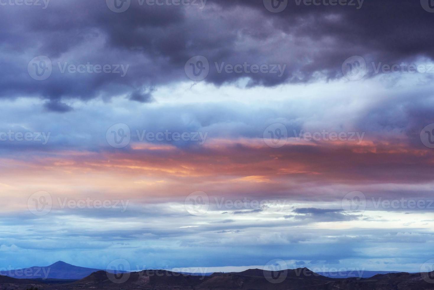 Beautiful fiery sunset, the evening sky in the fire photo