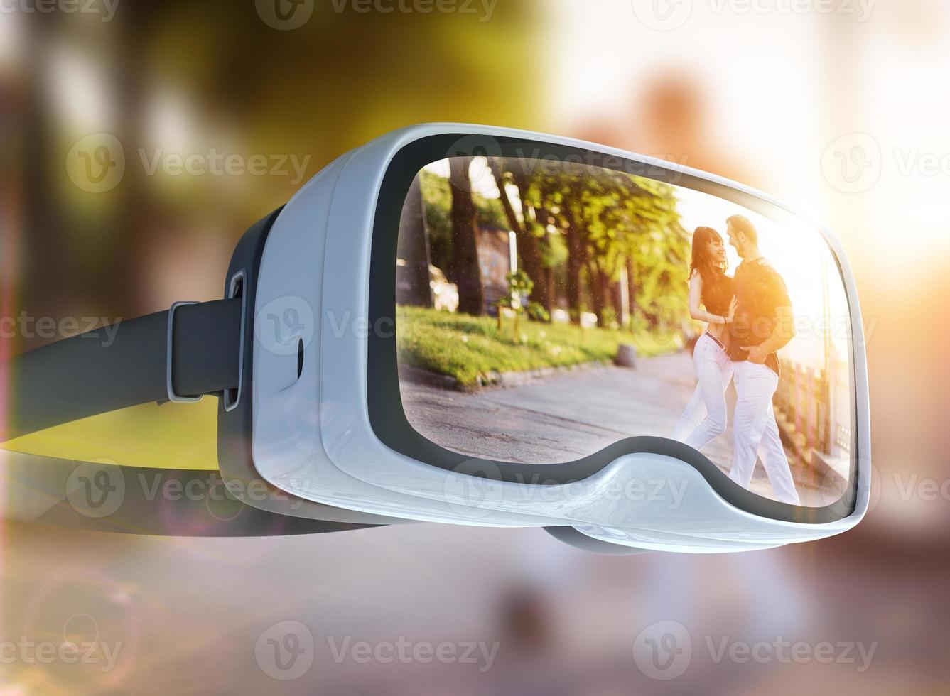 Virtual reality headset, double exposure. Young couple dancing tango on the quay photo