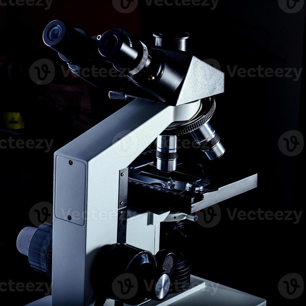 Close up of microscope at the laboratory. photo