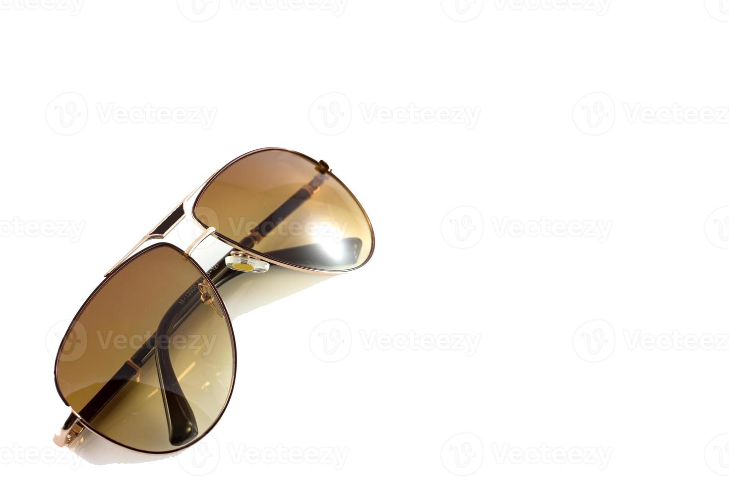 metal sunglasses isolated on white background photo