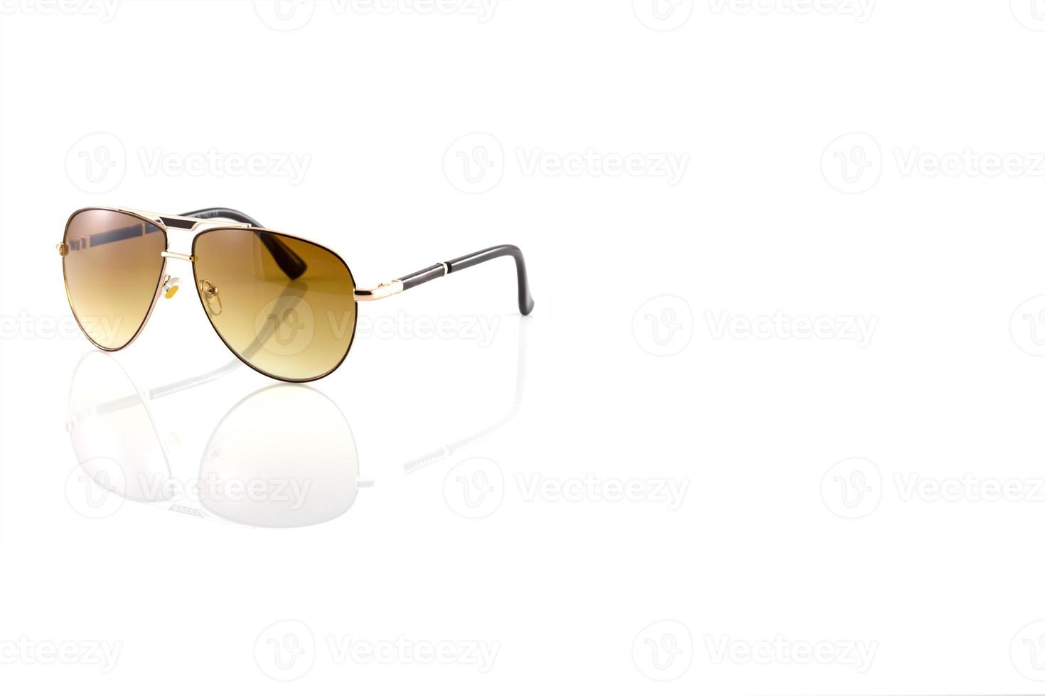 metal sunglasses isolated on white background photo