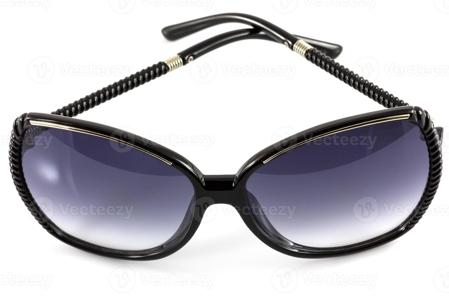 Black fashion sunglasses isolate on white background photo