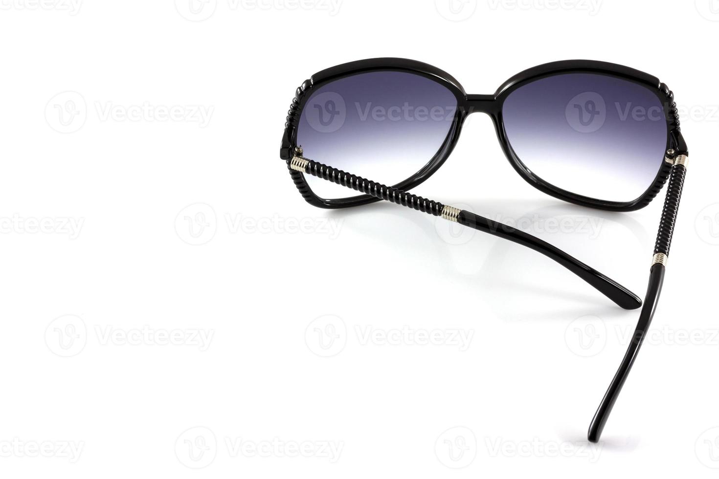 Black fashion sunglasses isolate on white background photo