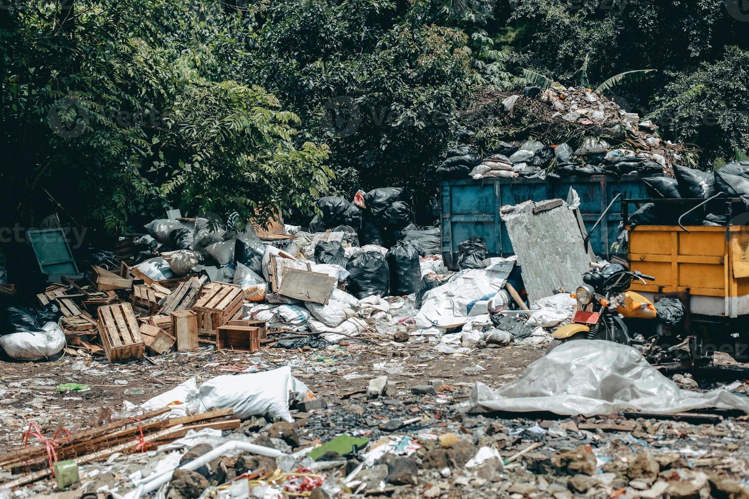 Garbage dump pile in trash dump or landfill, pile of garbage dump in pollution concept, earth day photo