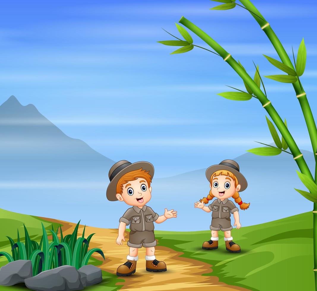 los niños del safari en el paisaje natural vector