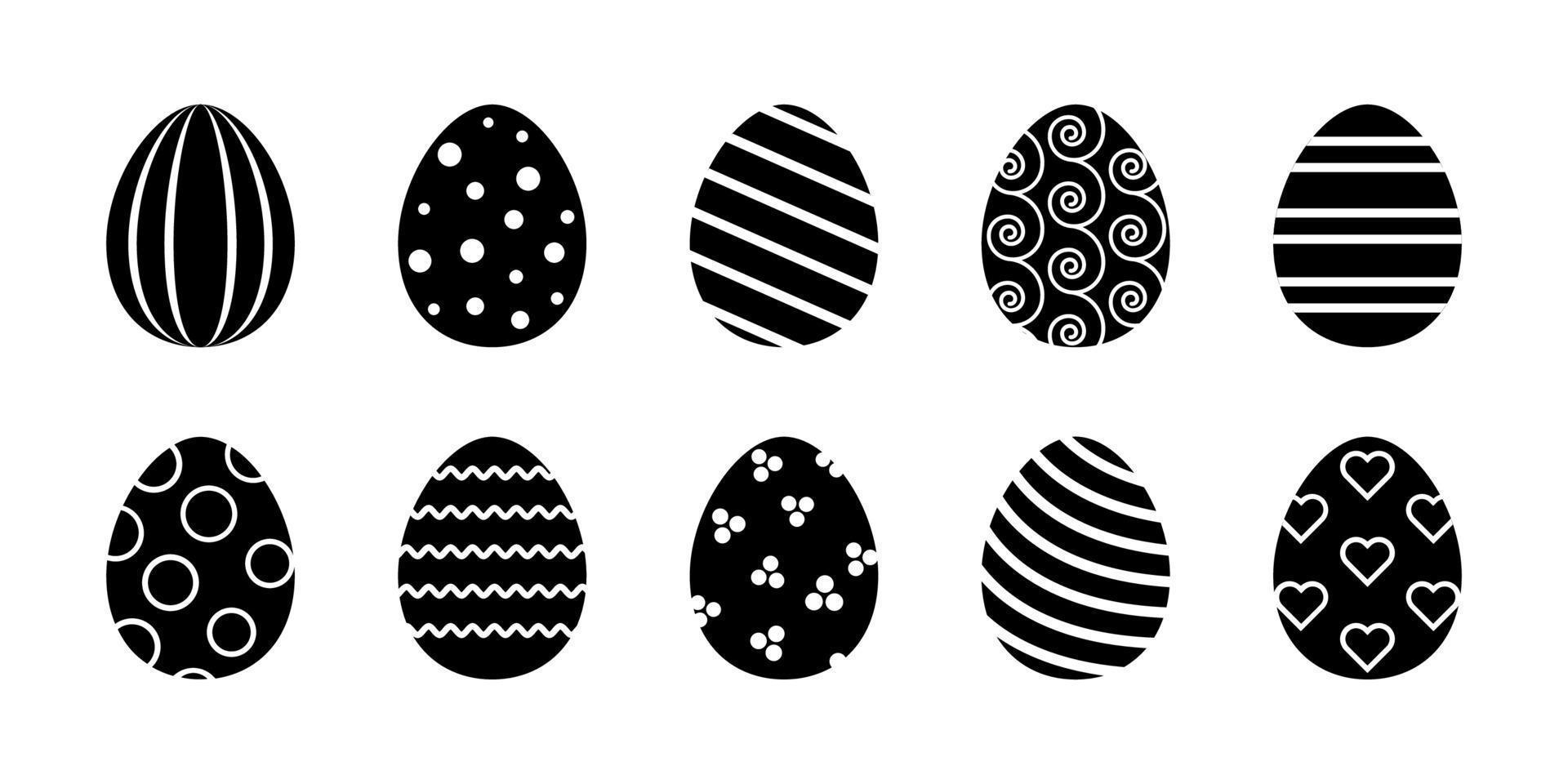Vector Easter eggs glyph collection. Set of black rubber stapms with decorated eggs