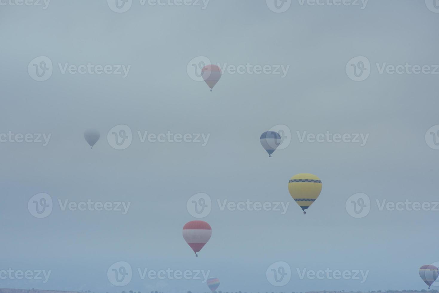 Balloon foggy morning in Cappadocia. TURKEY blurred images photo