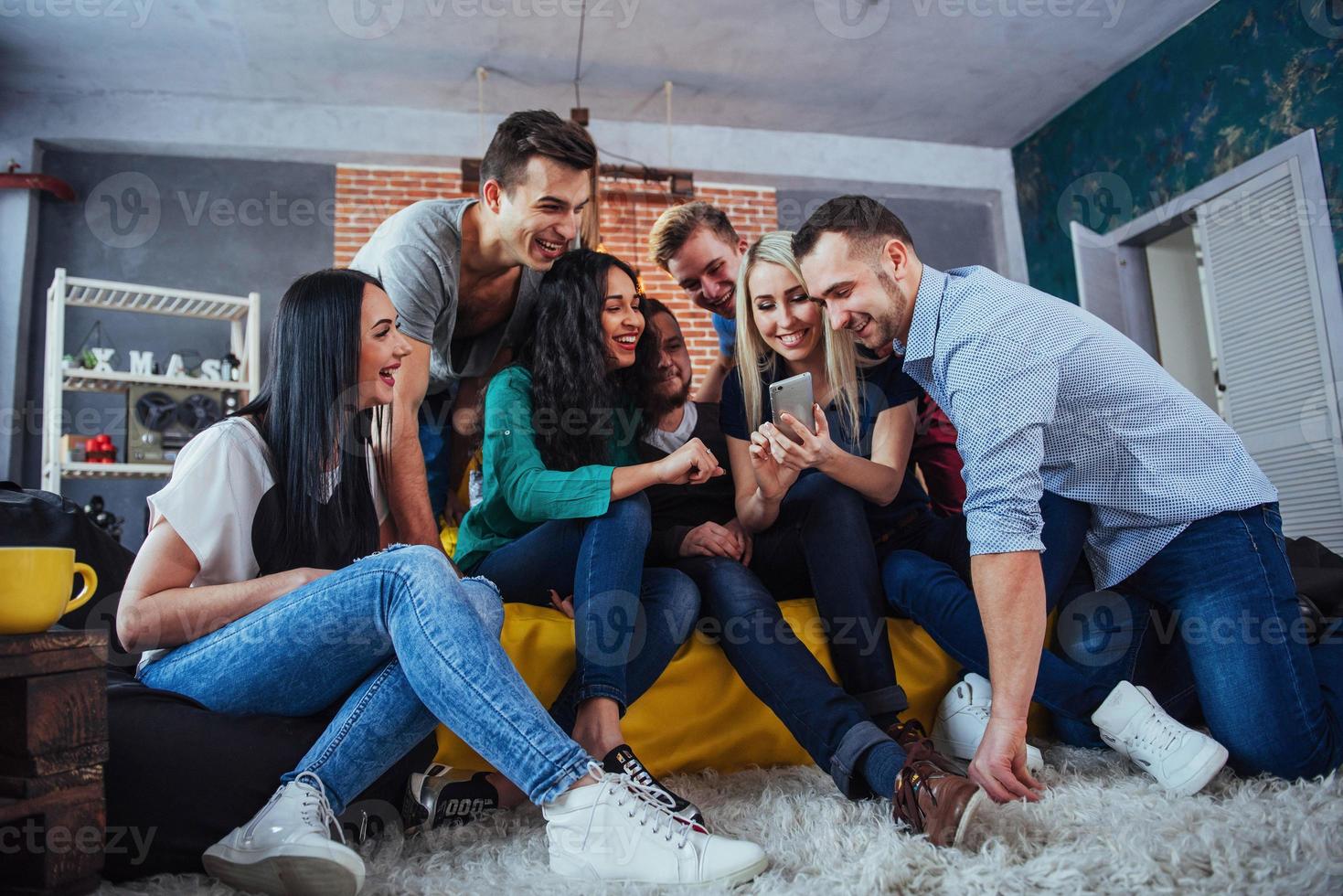 Group portrait of Cheerful old friends communicate with each other, friend posing on cafe, Urban style people having fun, Concepts about youth togetherness lifestyle. Wifi connected photo