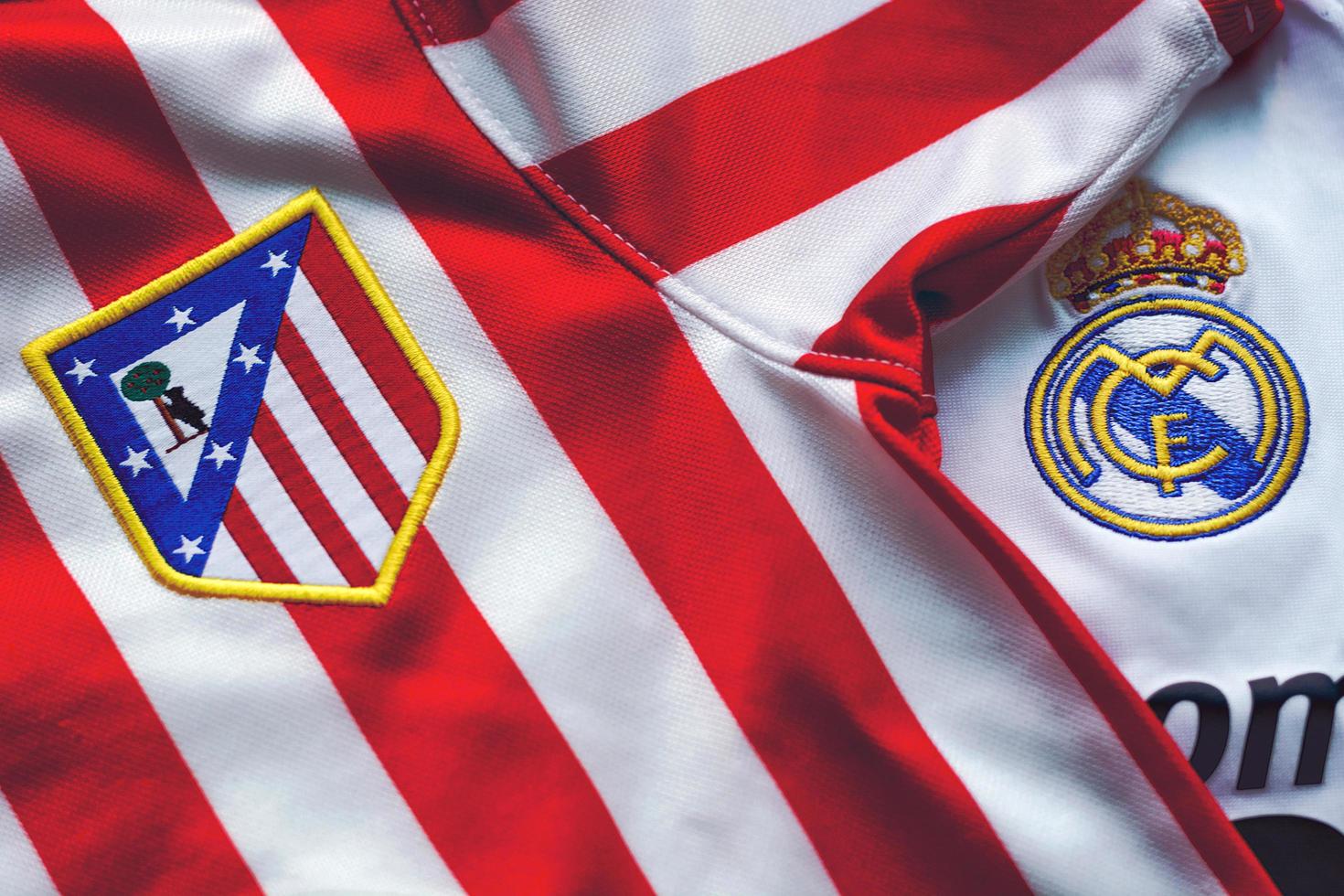 Close-Up on Logo of Atletico Madrid Football Club and Real Madrid photo