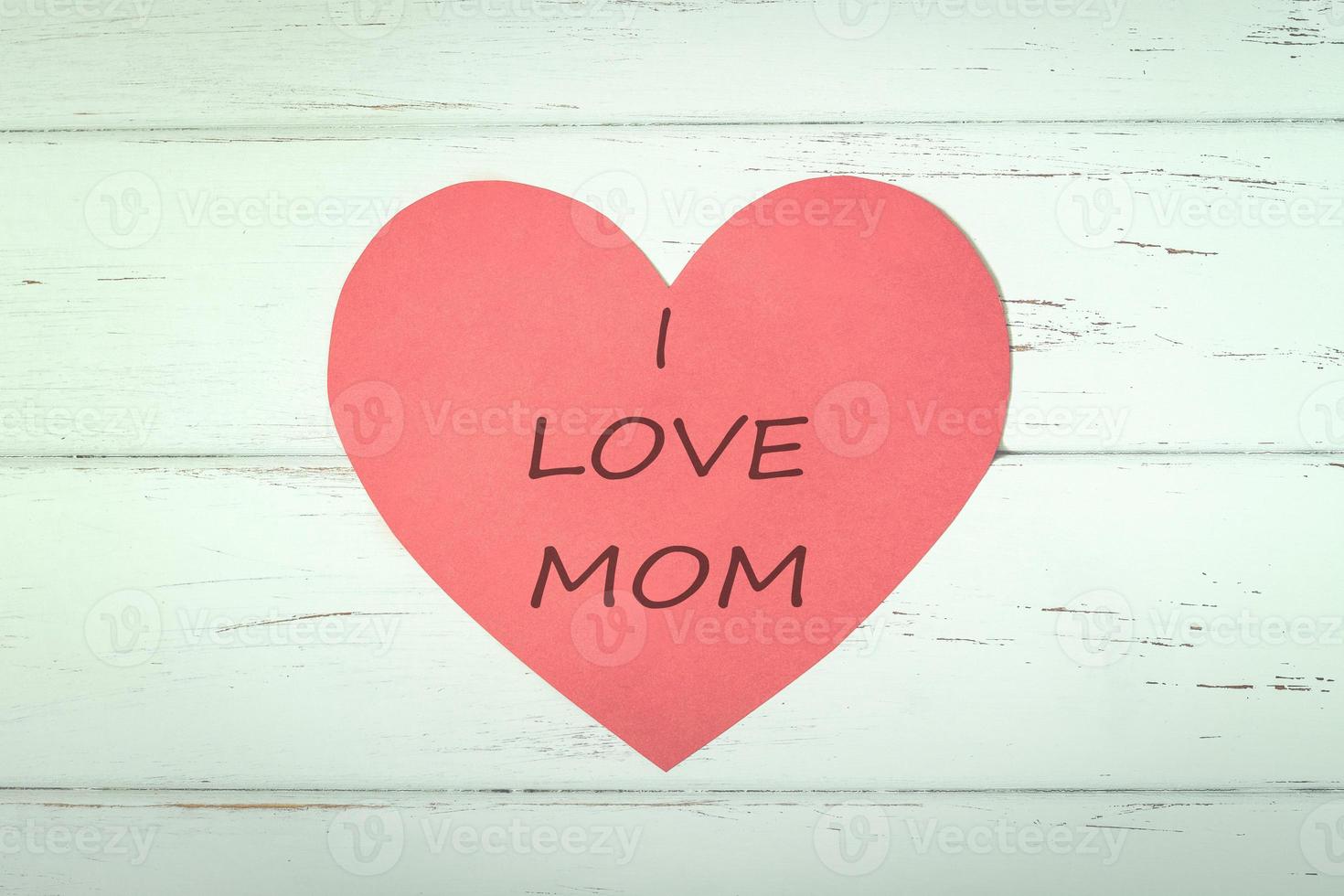 I love Mom,heart on a wooden table photo