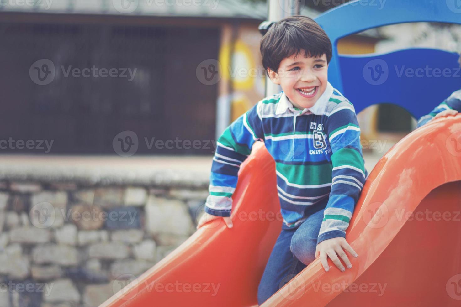 happy child playing in the park photo