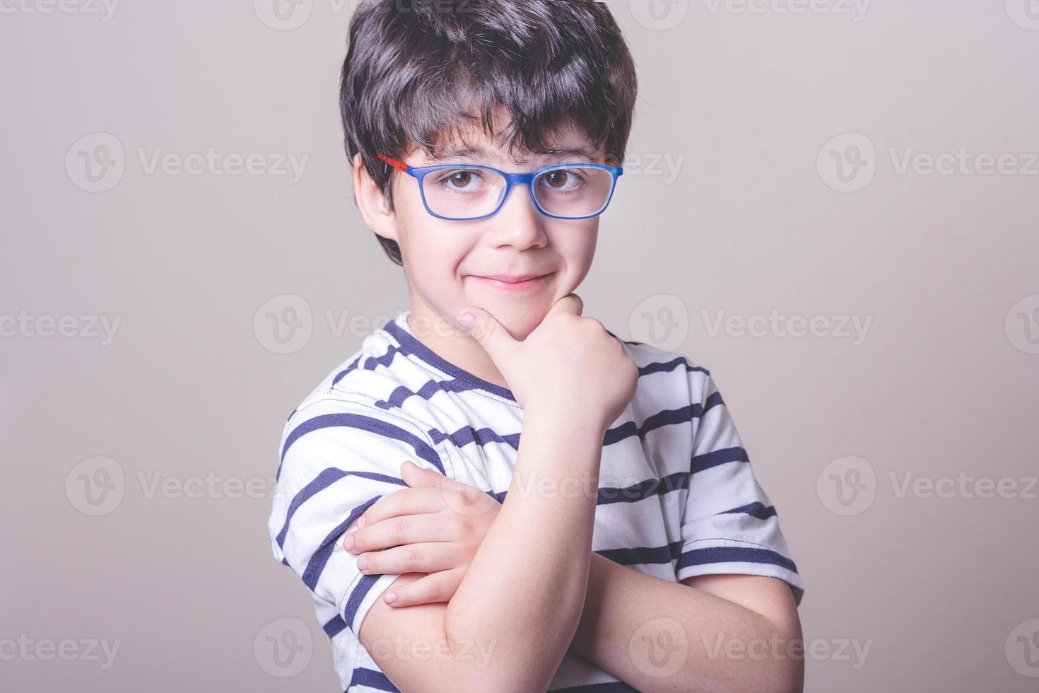 smiling boy with glasses photo