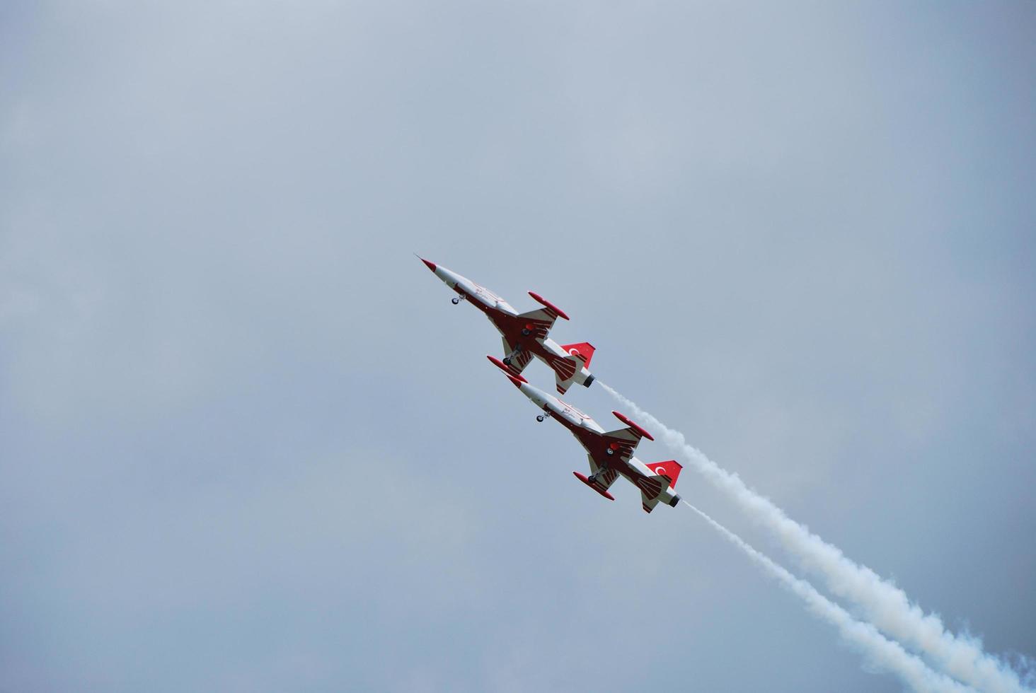 two very fast tip planes fly up photo