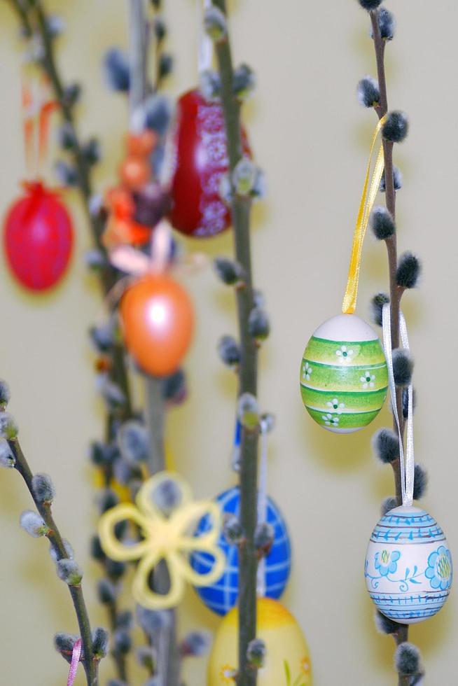 lots of colorful painted eggs on an easter tree photo