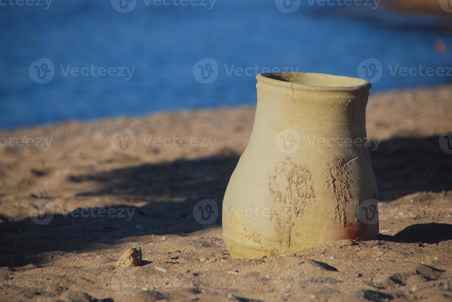 vase on the beach photo