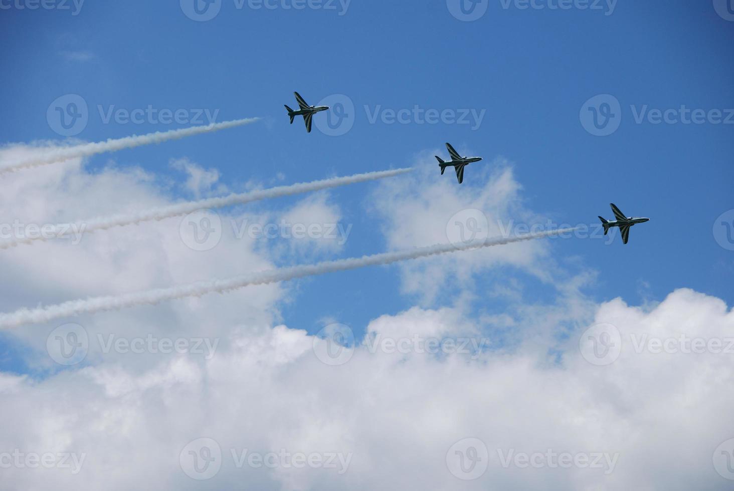 three airplanes with white clouds photo
