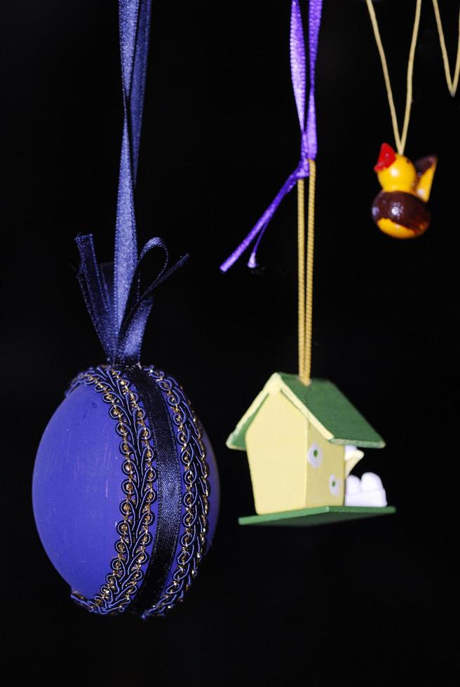 easter tree with purple easter egg and small tree and duck photo