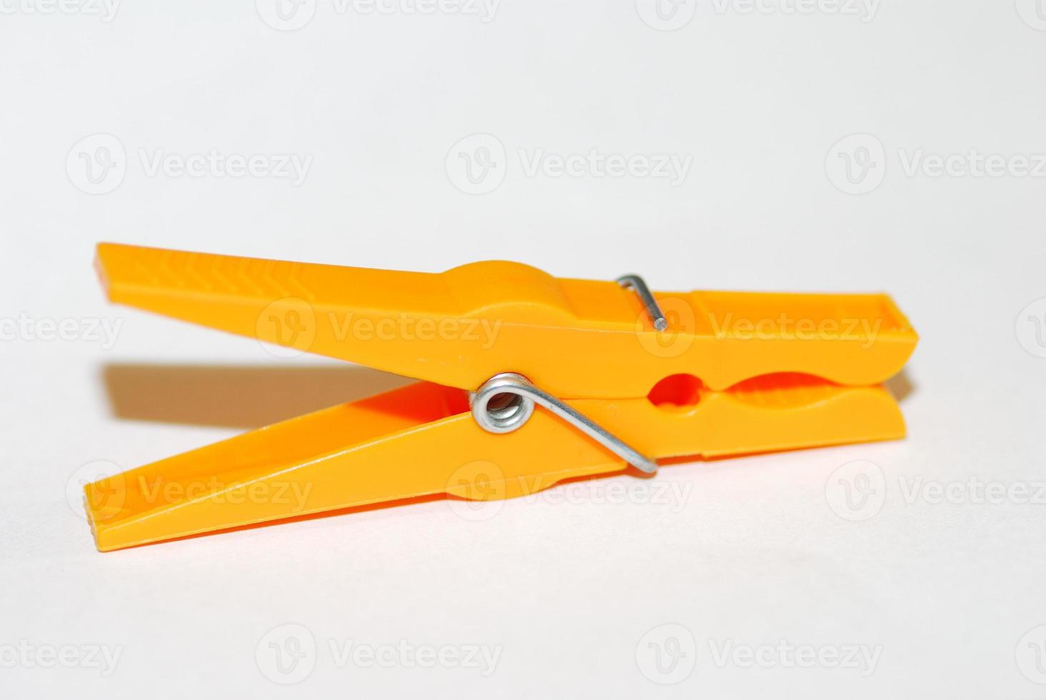 clothesspin on white background photo