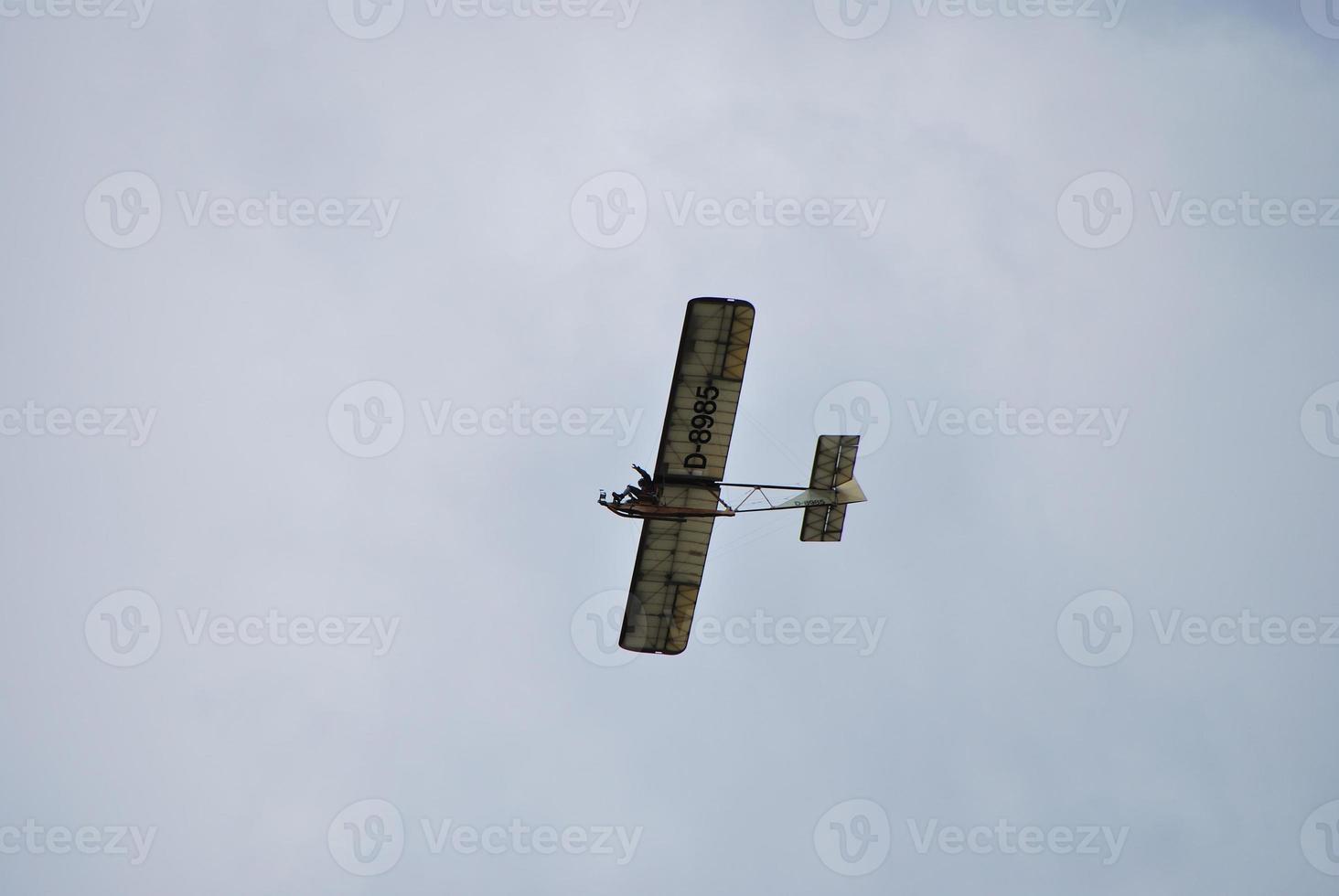 old aircraft on the sky photo