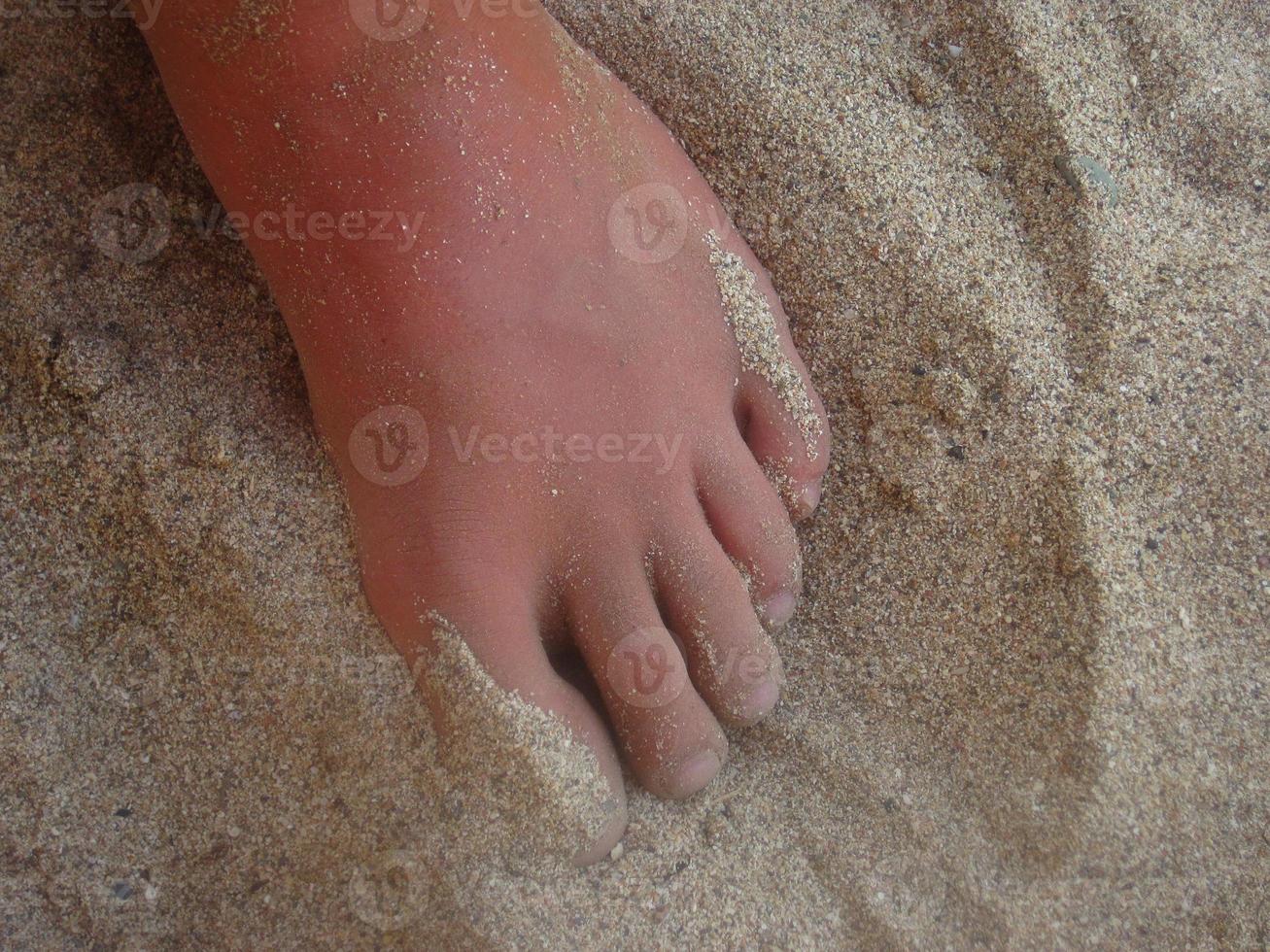 foot in the sand photo