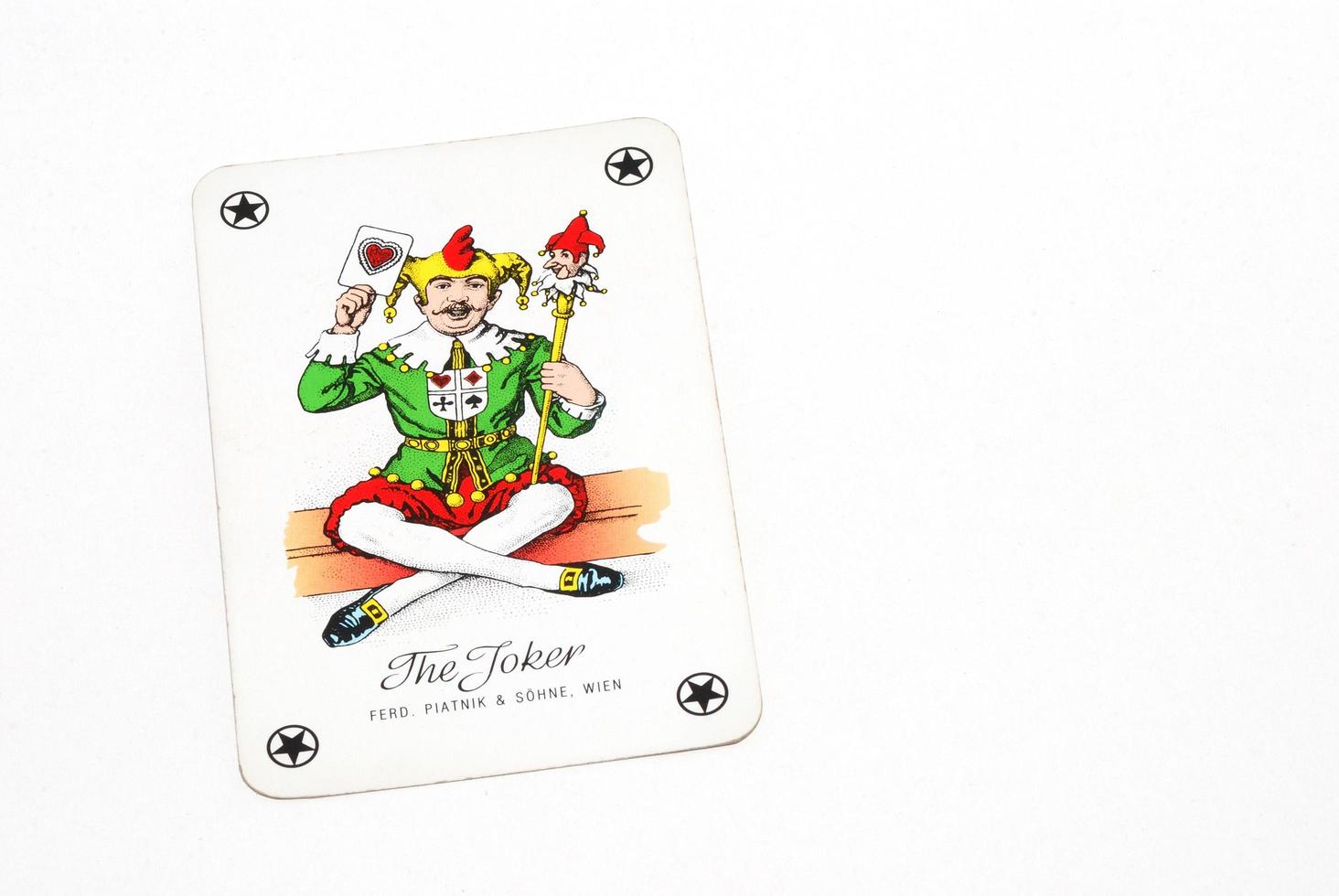 playing card joker winner luck of game left on white photo