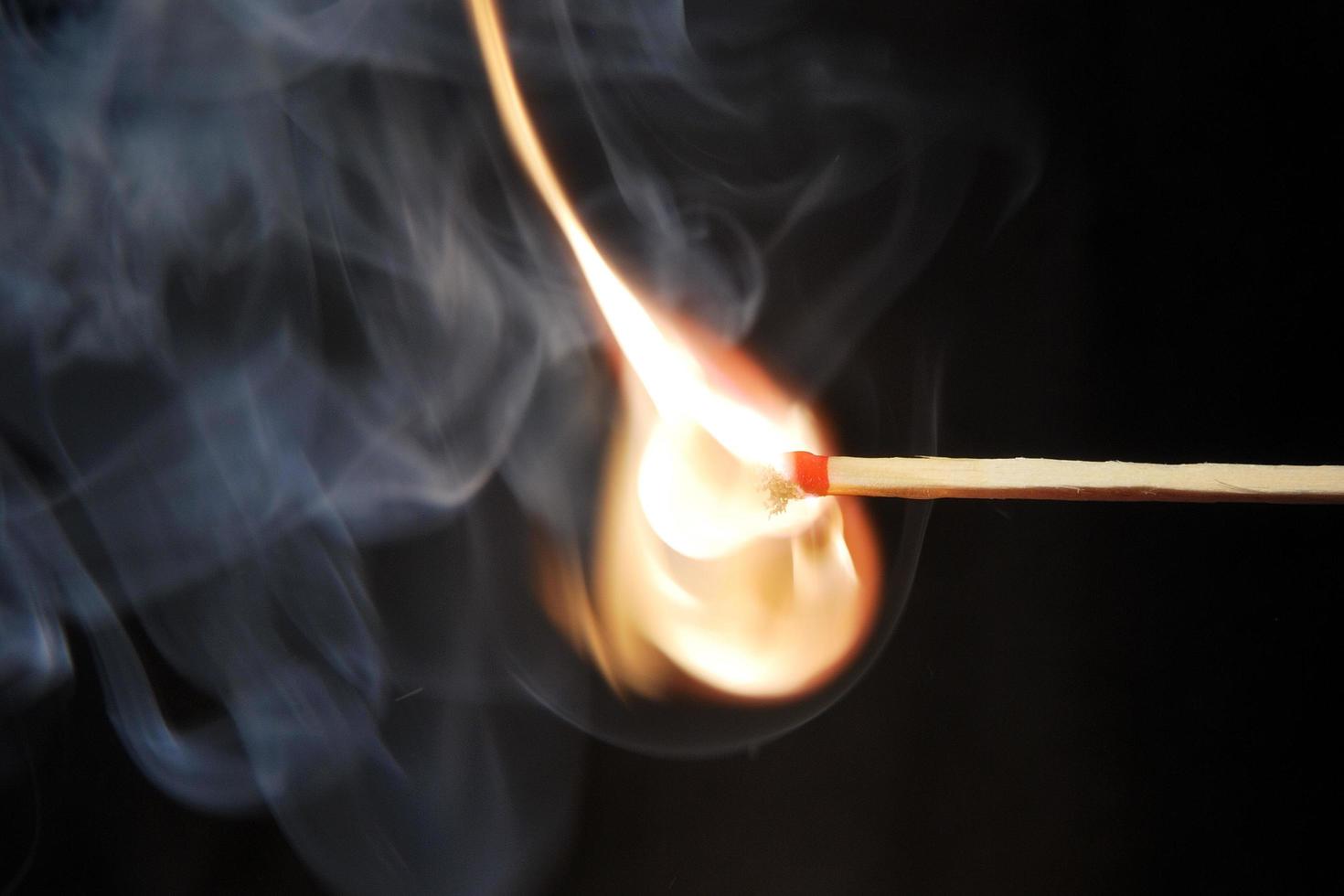 ignited matchstick close up view photo